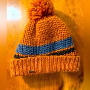 Winter hat line black with pom-pom.